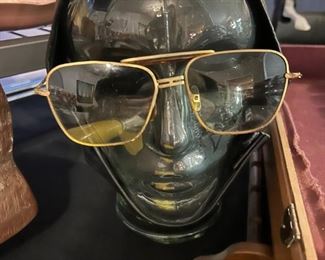 Glasses and pilots cap. The display piece is mine. 