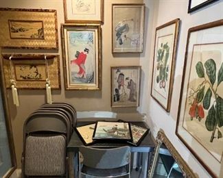 Another view of the artwork and a cool metal table and chair