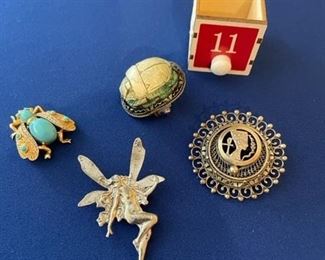 Set of 4 pins, blue and gold bug is vintage Trafari $18