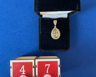 14k gold egg charm 2.8 gr. $110