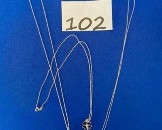 Trio of necklaces (shamrock, snowflake and 3 stone topaz) $15