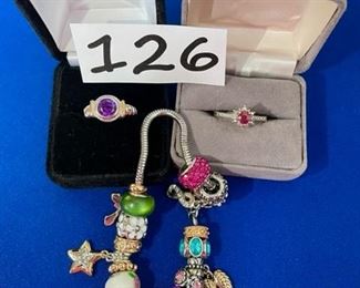 Park charm bracelet; amethyst silver and gold ring; ruby and diamond ring $15