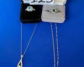 Aqua ring Sz. 8.5; dark green stone ring 8.5; citrine necklace and rhinestone necklace $20
