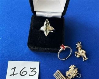 Marquis shaped Prasiolite sterling ring Sz. 9; charms (some sterling) and garnet sterling ring Sz.8.5 $18