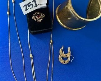 Brass cuff and necklaces and pins $12