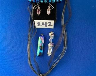 Irredescent bracelet and pendant, purple stone earrings, purple and black necklace $20
