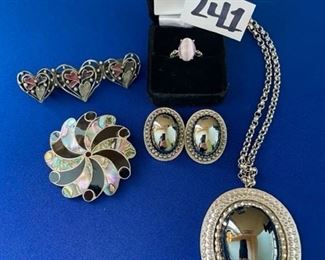 Silver toned necklace and earring set, hair clip, size 6 ring, and sterling swirl pin $15