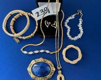 Rhinestone stretch bracelets, Blue and gold pendant necklace, rhinestone pin and heart earrings $15