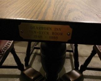 PLAQUE ON SIDE OF TABLE 