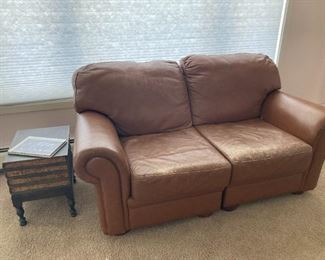 Leather two piece loveseat, Stacked book end table