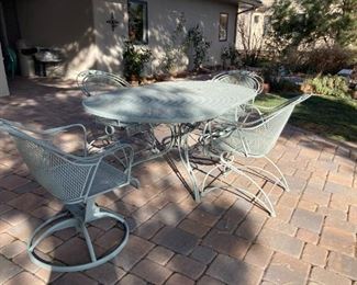 Outdoor patio set - oval table with (2) swivel chairs and (2) tilting chairs