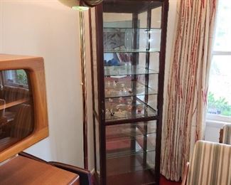 3 Howard Miller lighted curio cabinets, $150 each Saturday