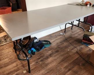 2 of these tables, legs fold flat, solid construction, somewhat heavy