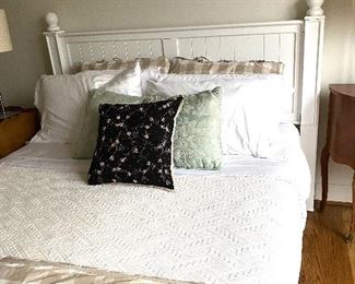 Queen size paneled bed (linens sold separately)