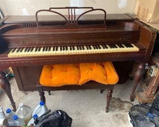 1950’s cherry wood piano with bench.