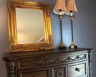 North Shore chest of drawers from Ashley Furniture; set of lamps (2); ornate mirror