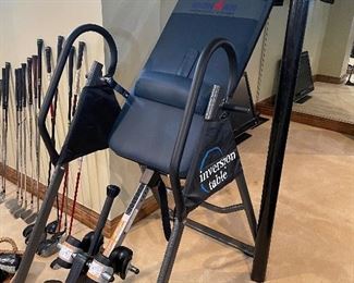 Inversion table and golf clubs in background :)
