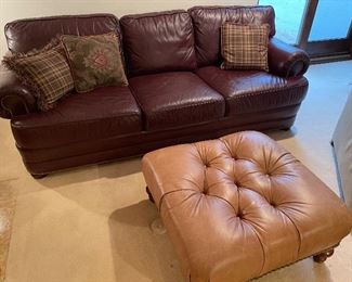 3-cushion leather couch and tufted leather ottoman
