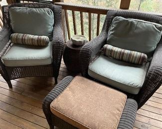 All-season wicker armchairs and ottoman, and side table