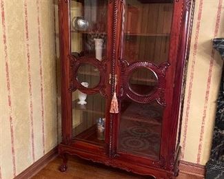 Large curio cabinet with wood shelves 