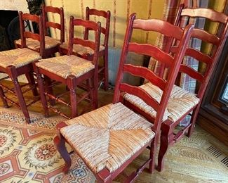 Chairs with rush seats:  Counter-height barstools (4 available) and ladder-back chairs (2 available)