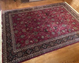 Large area rug - 100% wool with hand-tied fringe - excellent condition.