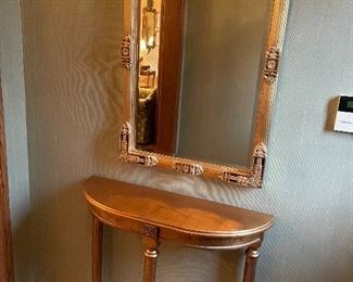 Gold mirror and gold half-round console/entryway table
