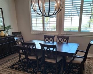 Dining table w/ 8 chairs/ leaf and pads.  Mint condition $950.00