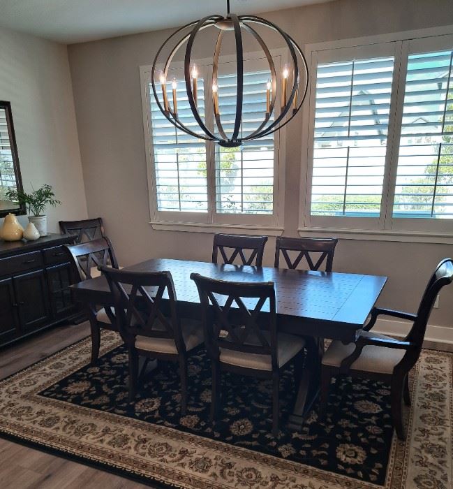 Dining table w/ 8 chairs/ leaf and pads.  Mint condition $950.00