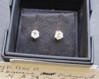 14k genuine diamond earrings 1/2 to 2/3 carats tw.