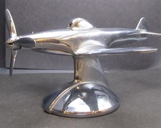 WWII era airplane lighter  Made in USA  turn the propeller and the cockpit opens to reveal the lighter 