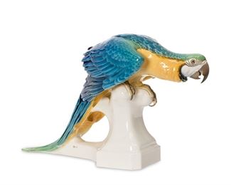 1001
A Large Nymphenburg Macaw Porcelain Figure
Circa 1913
Marked with impressed Nymphenburg shield and numbered "3641" to underside; impressed "T Karner" with artists cipher and dated 1913 to side
Designed by Theodor Karner, the glazed porcelain macaw resting on a plinth
14.5" H x 7.5" W x 24" D
Estimate: $1,000 - $2,000