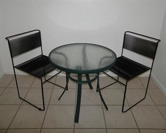 Indoor/outdoor round table with two wire chairs $50