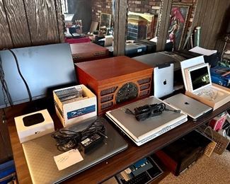 Laptops, printers, monitor, peripherals (keyboards, mice, speakers), Apple TV