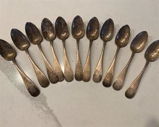 Set of 11 Daniel Low coin silver spoons