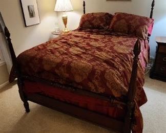 4 poster Mahogany Full bed. Includes bedding ,mattress / box spring.