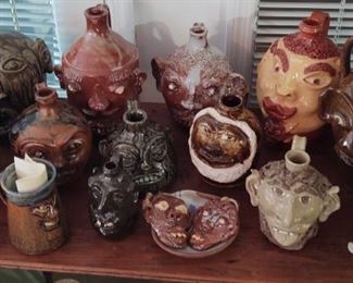 Lots Of Pottery Face Jugs