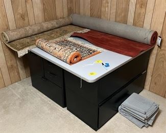 Area Rugs and Large Table with Storage Underneath.  Was used for Sewing.