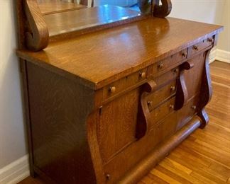 Antique hutch with beveled mirror