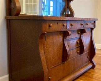 Antique hutch with beveled mirror