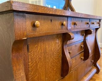 Antique hutch with beveled mirror