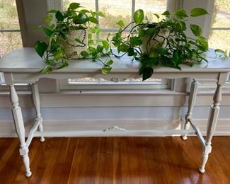 Vintage cottage style entry table; assorted potted plants of various sizes