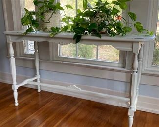 Vintage cottage style entry table; assorted potted plants of various sizes