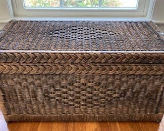 Vintage wicker chest with brass accents and glass table top