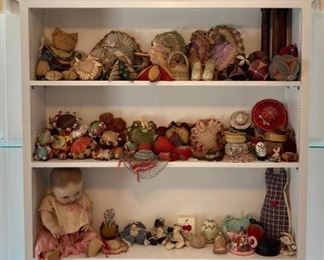 Vintage dolls, sewing storage and pin cushions