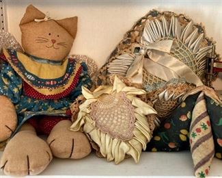 Vintage dolls, sewing storage and pin cushions