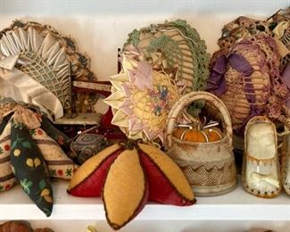 Vintage dolls, sewing storage and pin cushions