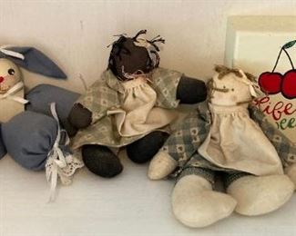 Vintage dolls, sewing storage and pin cushions