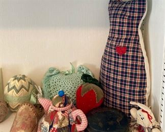 Vintage sewing storage and pin cushions