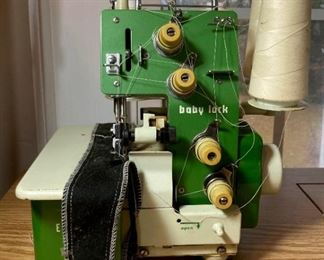 Baby Lock EA-605 serger sewing maching with serger books